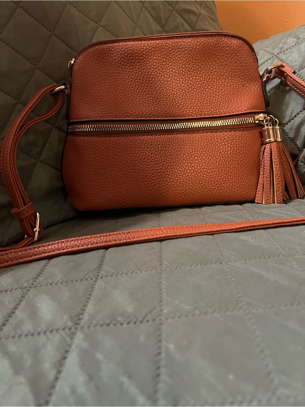 Textured Tan Crossbody Bag with Tassel Accent